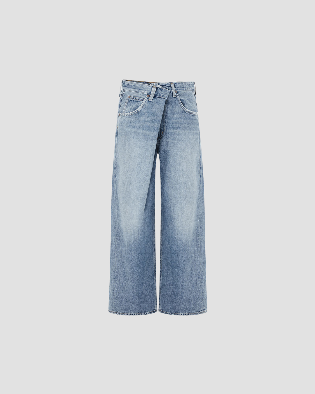 jean large vana agolde ; jambes larges et fermeture croisée sur le devant. modèle mode et très looké 