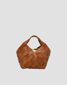 sac tressé à la main 
modèle intemporel et facile à porter 
sublimera vos looks 